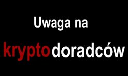 napis Uwaga na kryptodoradców