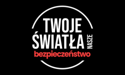 plakat akcji - twoje światła nasze bezpieczeństwo na czarnym tle